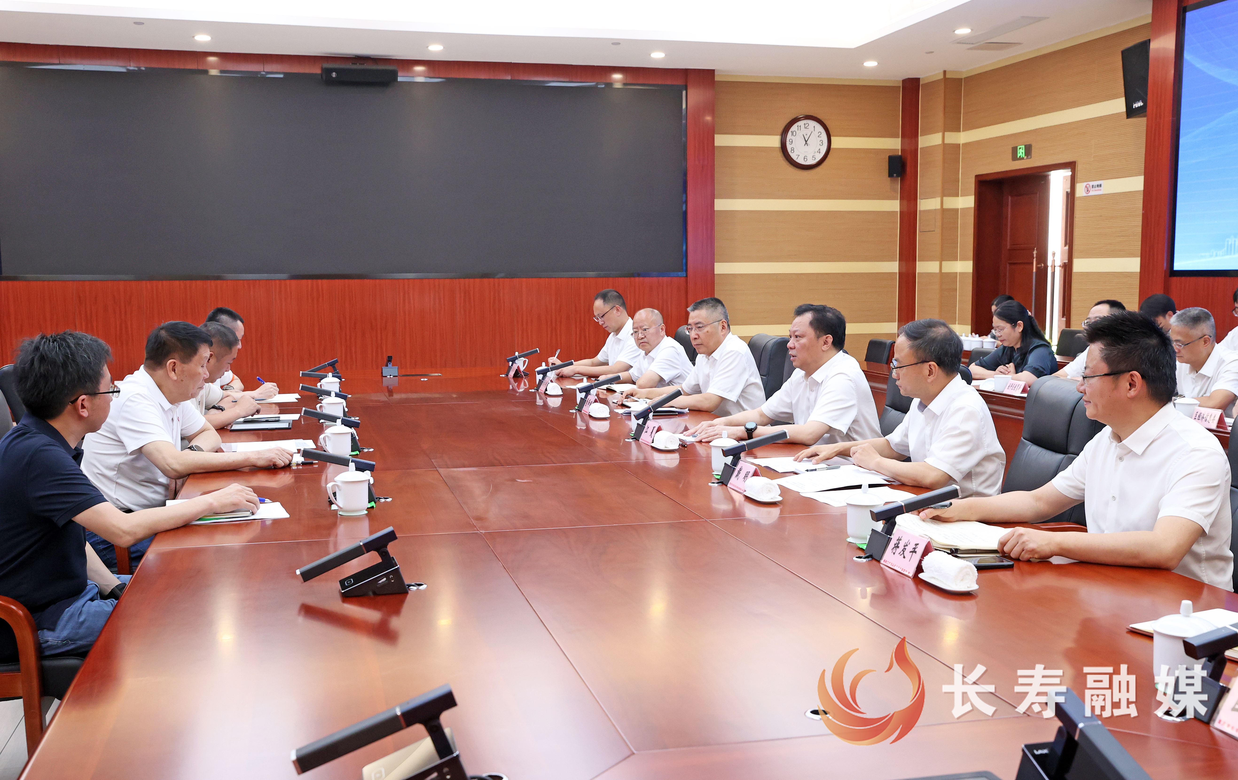 江夏戴明会见重庆小康控股有限公司党委书记、董事长张兴明一行